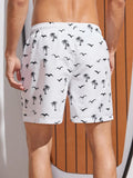 Men Coconut Tree & Bird Print Drawstring Waist Swim Trunks