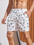 Men Coconut Tree & Bird Print Drawstring Waist Swim Trunks